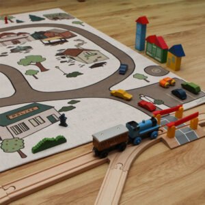 Children's rug made of natural fabrics, wooden train on cork carpet