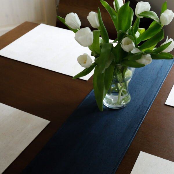 A combination of cork leather table runners and placemats will decorate your dining area in a sustainable and unique way